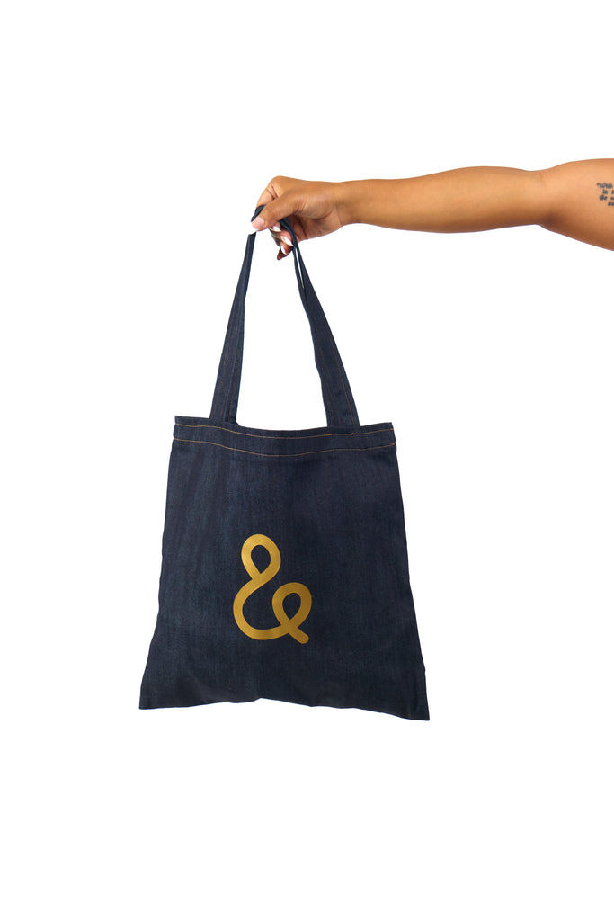 kathy denim tote bag shown with Signature Gold Cali & Dana logo